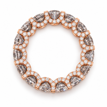 A rose gold eternity ring featuring marquise-cut gray diamonds and round brilliant-cut diamonds, photographed on a clean white background.