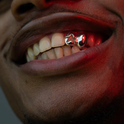 Window Star & Canine Grillz