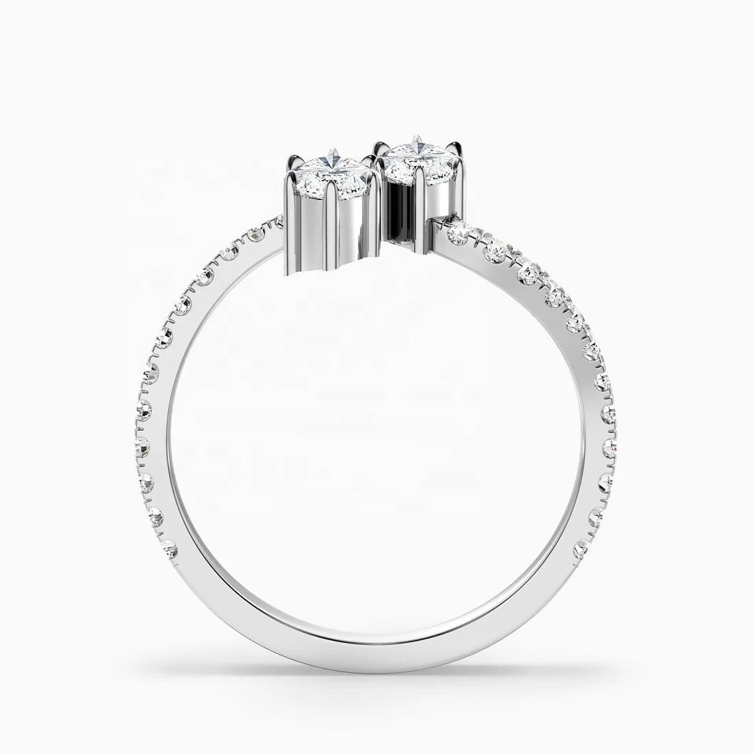 Diamond ring with a central stone and smaller stones on a white background